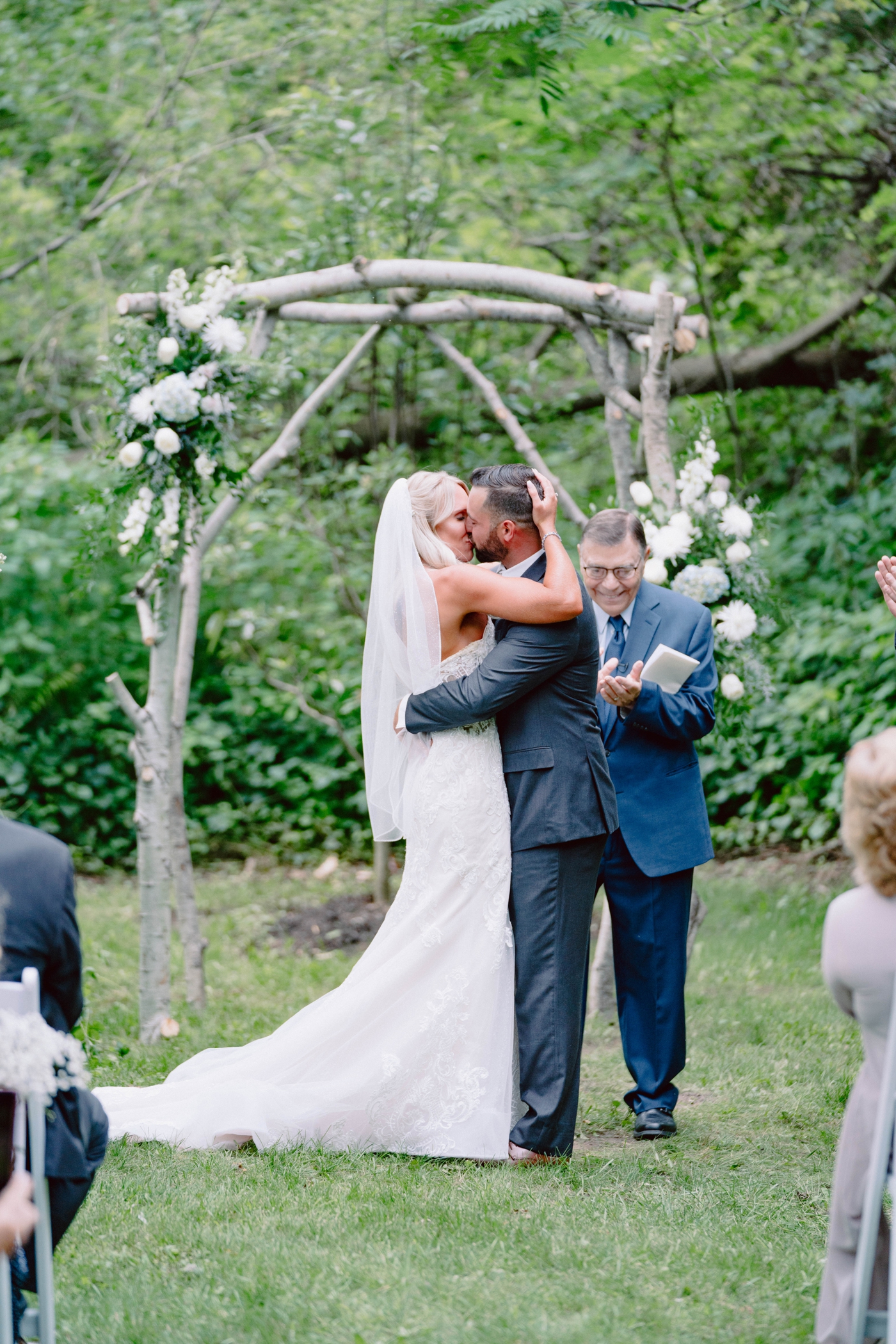 Bride and groom first kiss